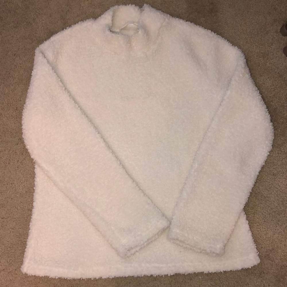 White fuzzy turtleneck sweater